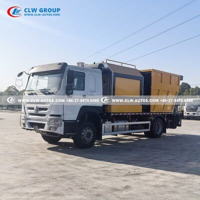 Sinotruk HOWO 4x2 Synchronous Chip Sealer with PLC Control and Large Insulated Asphalt Tank for Durable Pavement Preservation